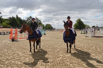 Olivia Spooner and Zea Adams Share Top Honours in STX-UK Pony Foxhunter Second Round at Wales and West 